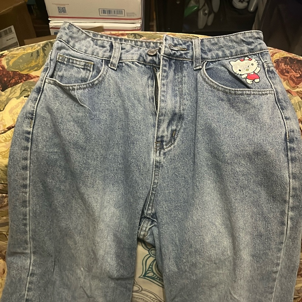 Faded and Well Worn Hello Kitty Medium Blue Jeans